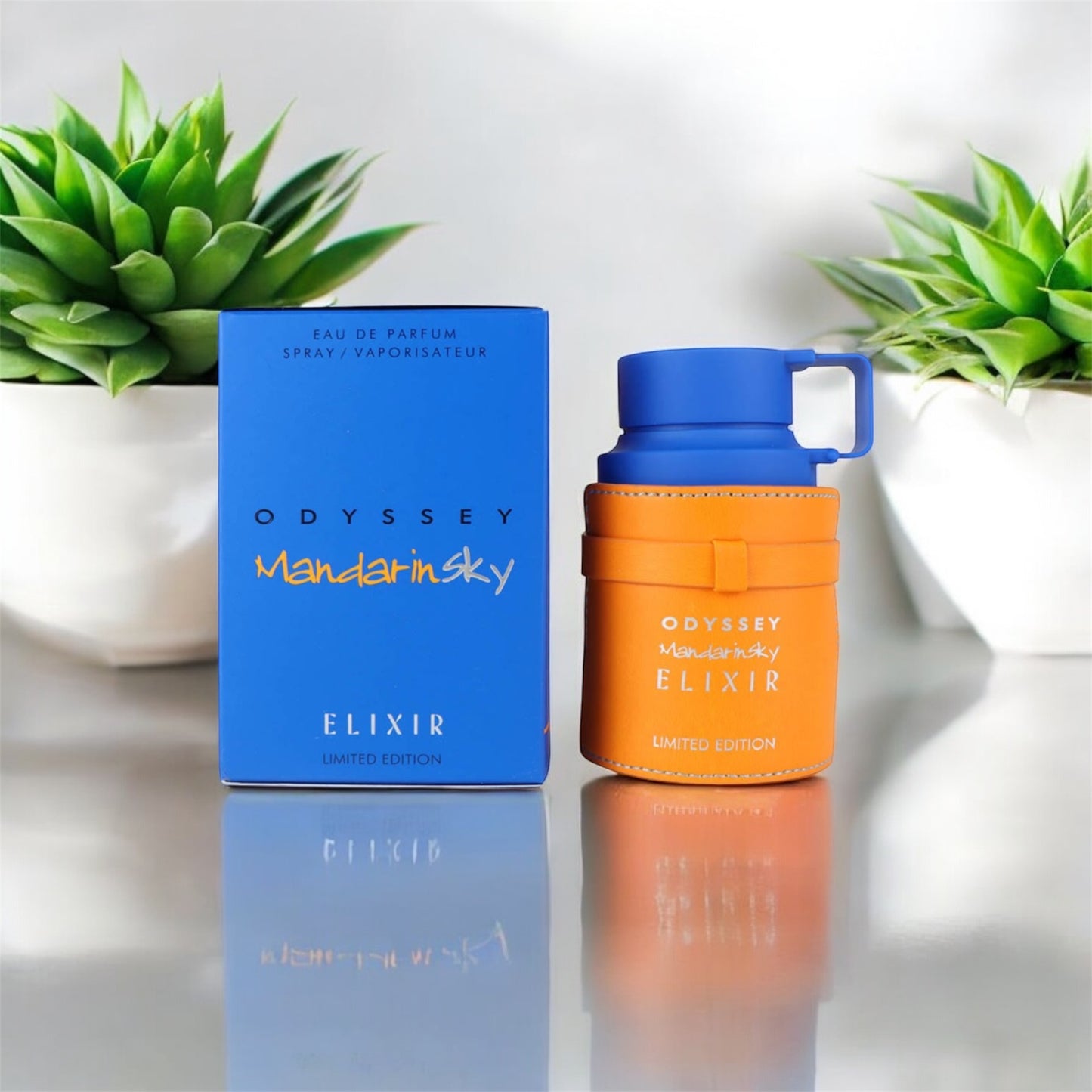 Perfume unisex Armaf Odyssey Mandarin Elixir Eau de Parfum 100ml con notas de mandarina, bergamota, jazmín y ámbar en frasco elegante y moderno